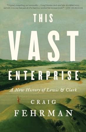 Book cover of This Vast Enterprise: A New History of Lewis & Clark by Craig Fehrman. The cover features a sweeping painted landscape of a wide river valley with green rolling hills and a vast sky. A small lone figure stands in the foreground on an open plain. At the top is a pull quote praising the book, attributed to Jon Meacham. The title is displayed in large white text, with the author's name at the bottom.